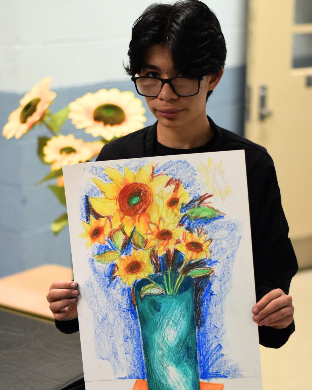 Camper with her sunflower drawing