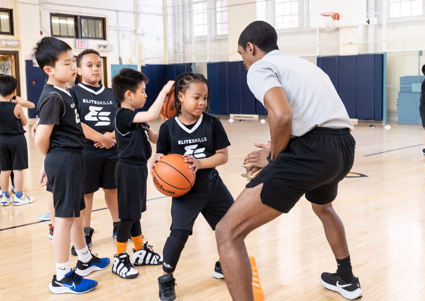 Coach working one-on-one at training